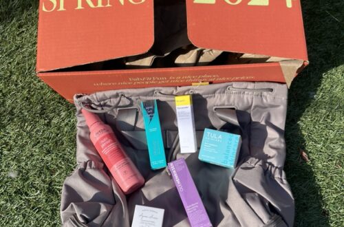 Bag with skincare and makeup products on top of it, under box with Spring 2024 written on it